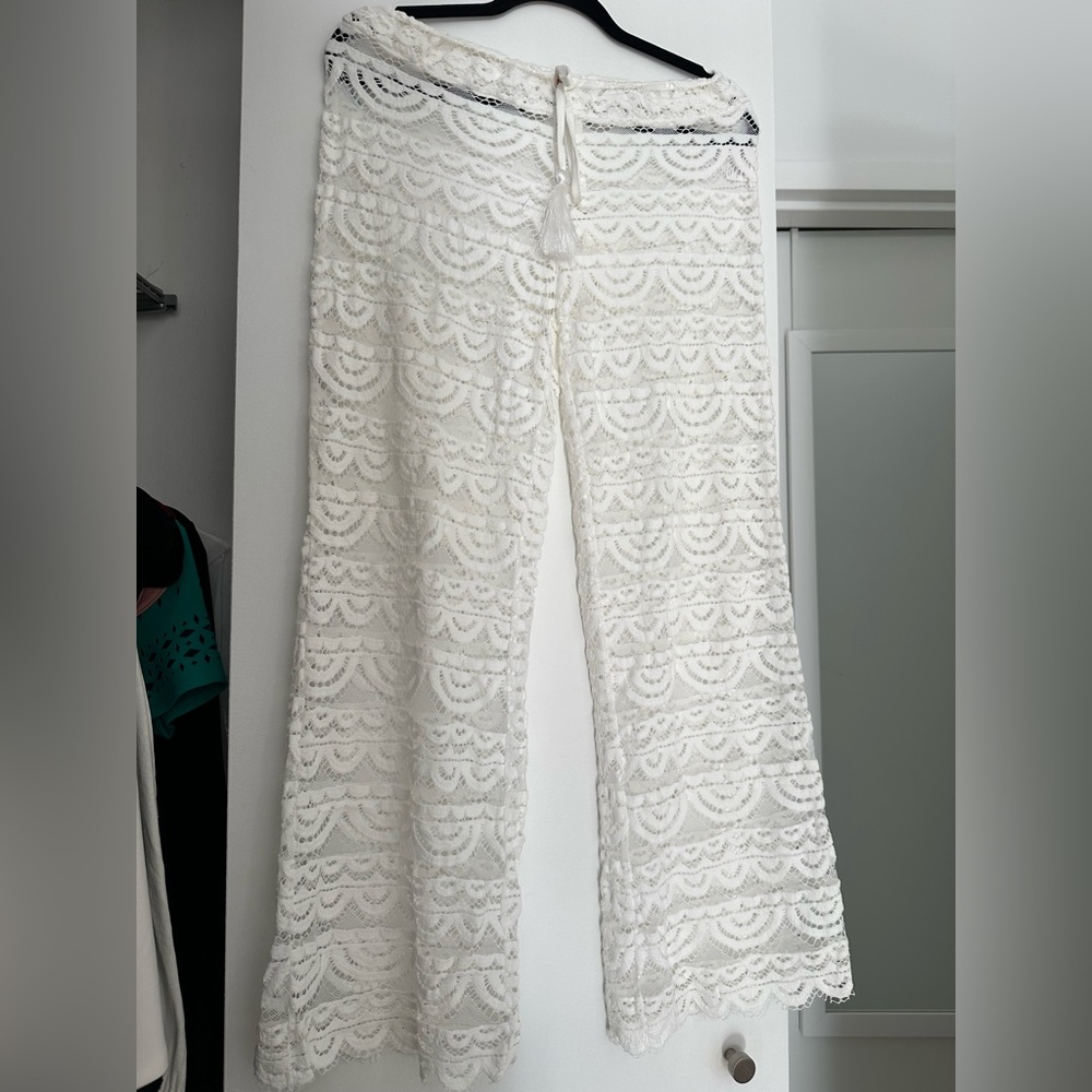 White beach cover up pants. Washed but never worn.